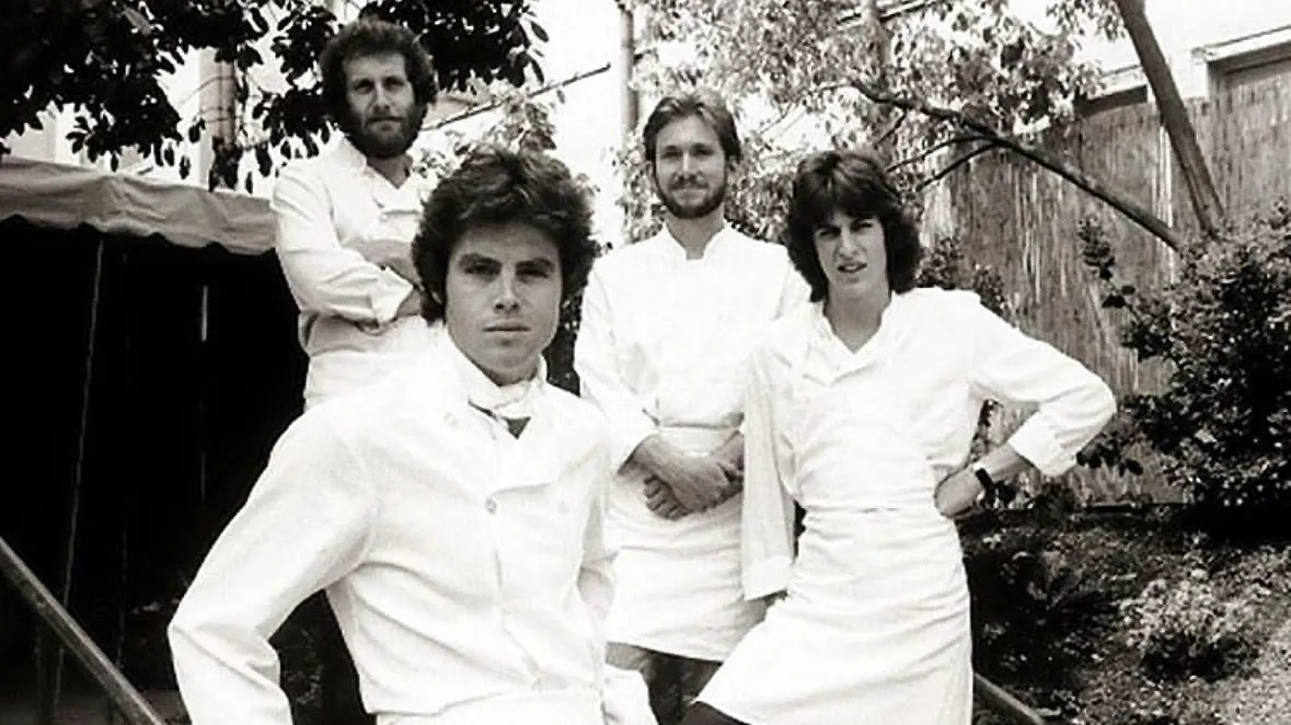 Michael McCarty (in the front) poses with a few members of the original crew at Michael's (left to right): Jonathan Waxman, Mark Peel, and Ken Frank.