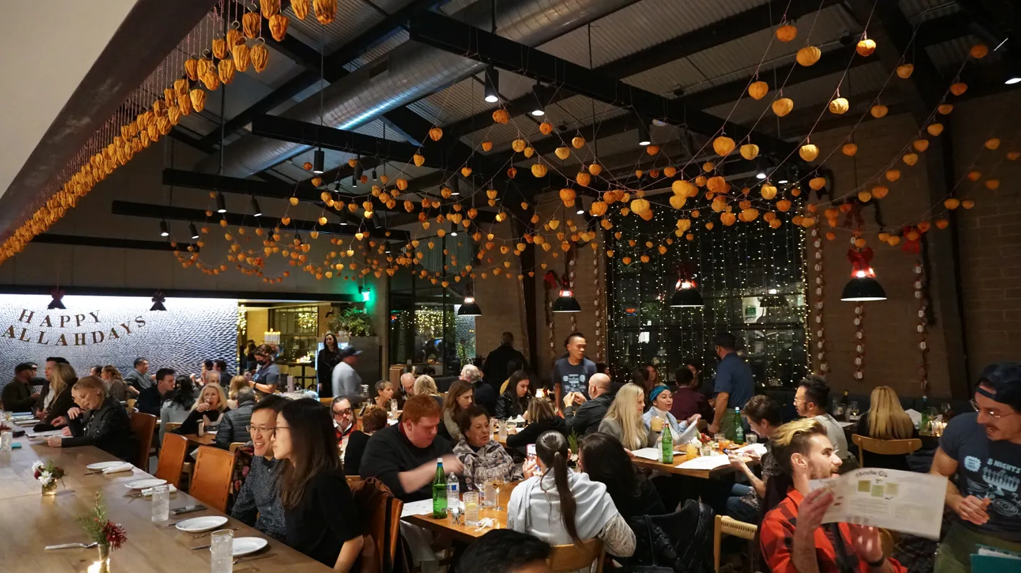 Hundreds of persimmons hang from the rafters of Birdie G's in Santa Monica, in the tradition of hoshigaki.