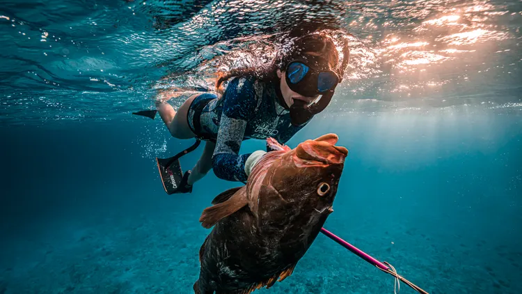 Terrified of the ocean in her youth, Valentine Thomas is now a champion spearfisherwoman.