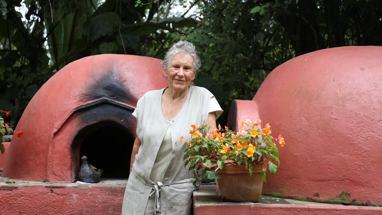 British-born Diana Kennedy smiles as she poses for a picture in front of bread ovens at her house in the city of Zitacuaro in the western state of Michoacan September 12, 2008. Kennedy has left behind the bland flavors of her homeland to become the world authority on a bewildering array of Mexican recipes from corn fungus crepes to blood sausage tacos. Now in her 80s, Kennedy is a cook's cook who was decorated with the Order of the Aztec Eagle, the highest honor given to foreigners in Mexico for her work traveling around the country garnering recipes and cataloging them in her cookbooks.