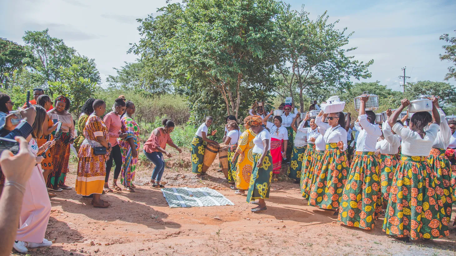 In Zambia, ichilanga mulilo is part of traditional wedding celebrations, whereby representatives of the bride (here in matching fabrics) cook for the groom’s friends and family.