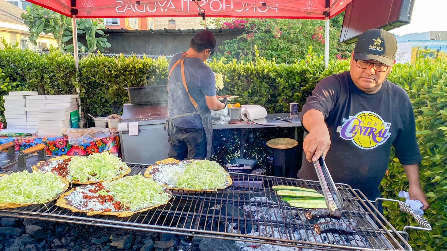 Chef Alfonso Martinez serves tlayudas from his front yard in Main Street in South Central Los Angeles.