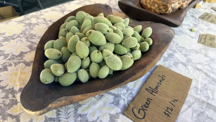Green almonds are in season at the farmers market