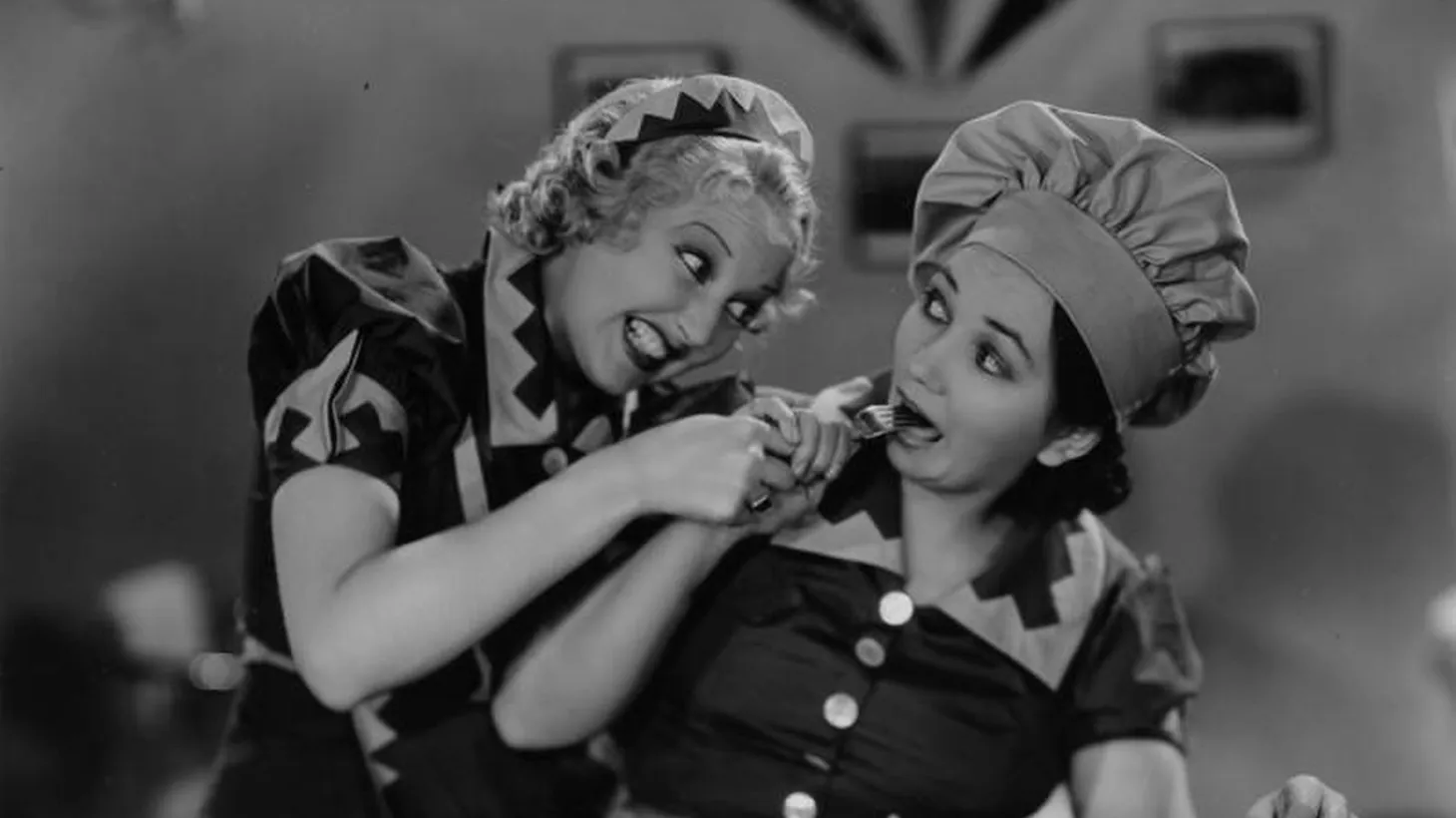 Thelma Todd (left) and Patsy Kelly (right) act out a scene from the 1936 comedy "An All-American Toothache."