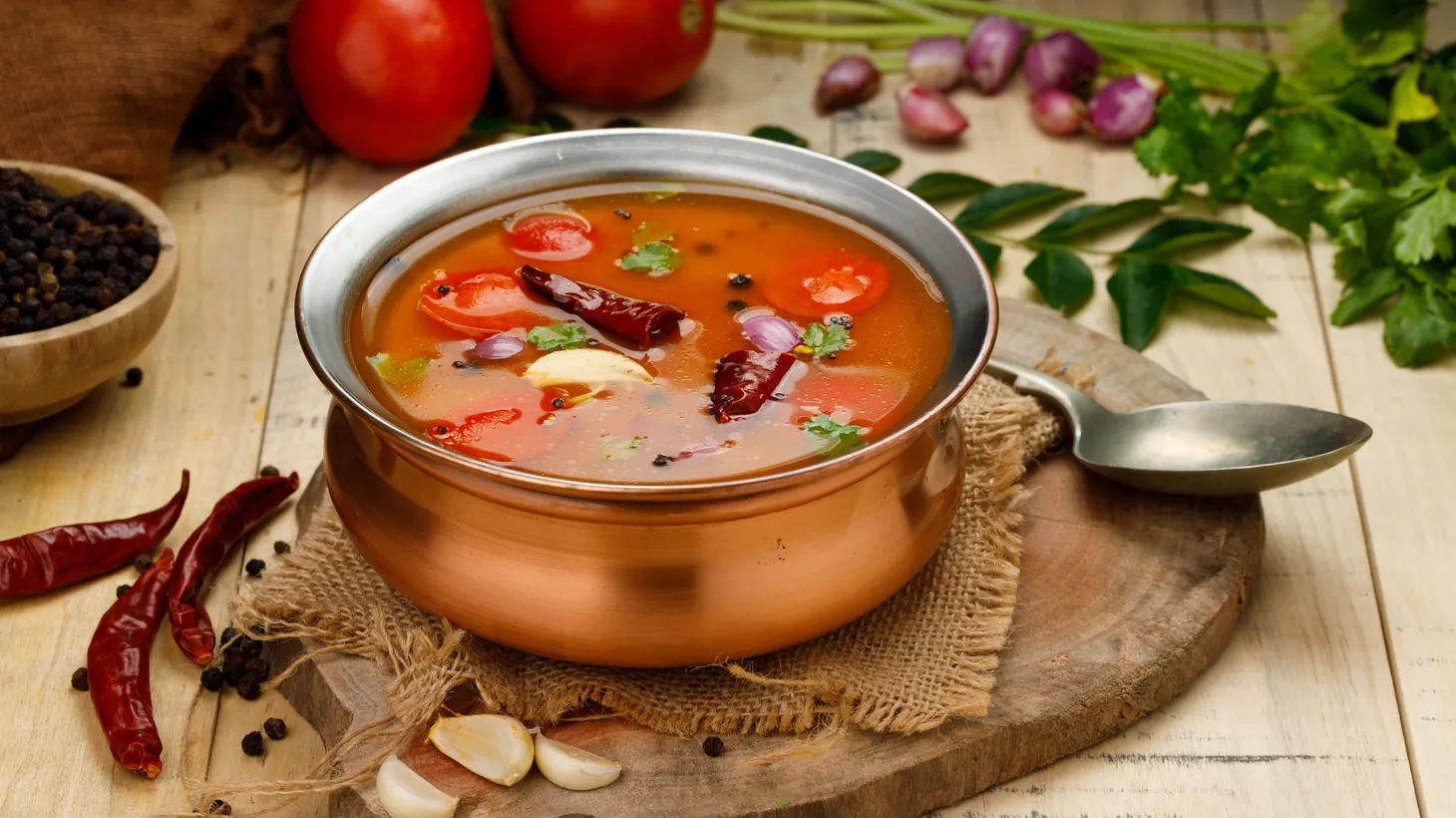 Rasam is a thin, brothy soup made from the stock of cooking pulses and lentils, and often it includes tomatoes. It’s a popular dish in the border regions of India.
