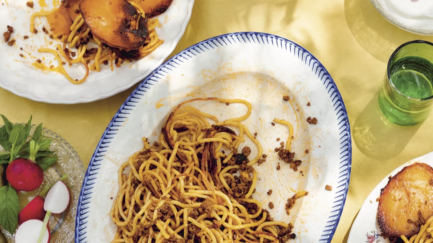 A double-cooked makaroni with turmeric and saffron inspired by spaghetti bolognese embodies the culinary traditions of both Iran and Italy.