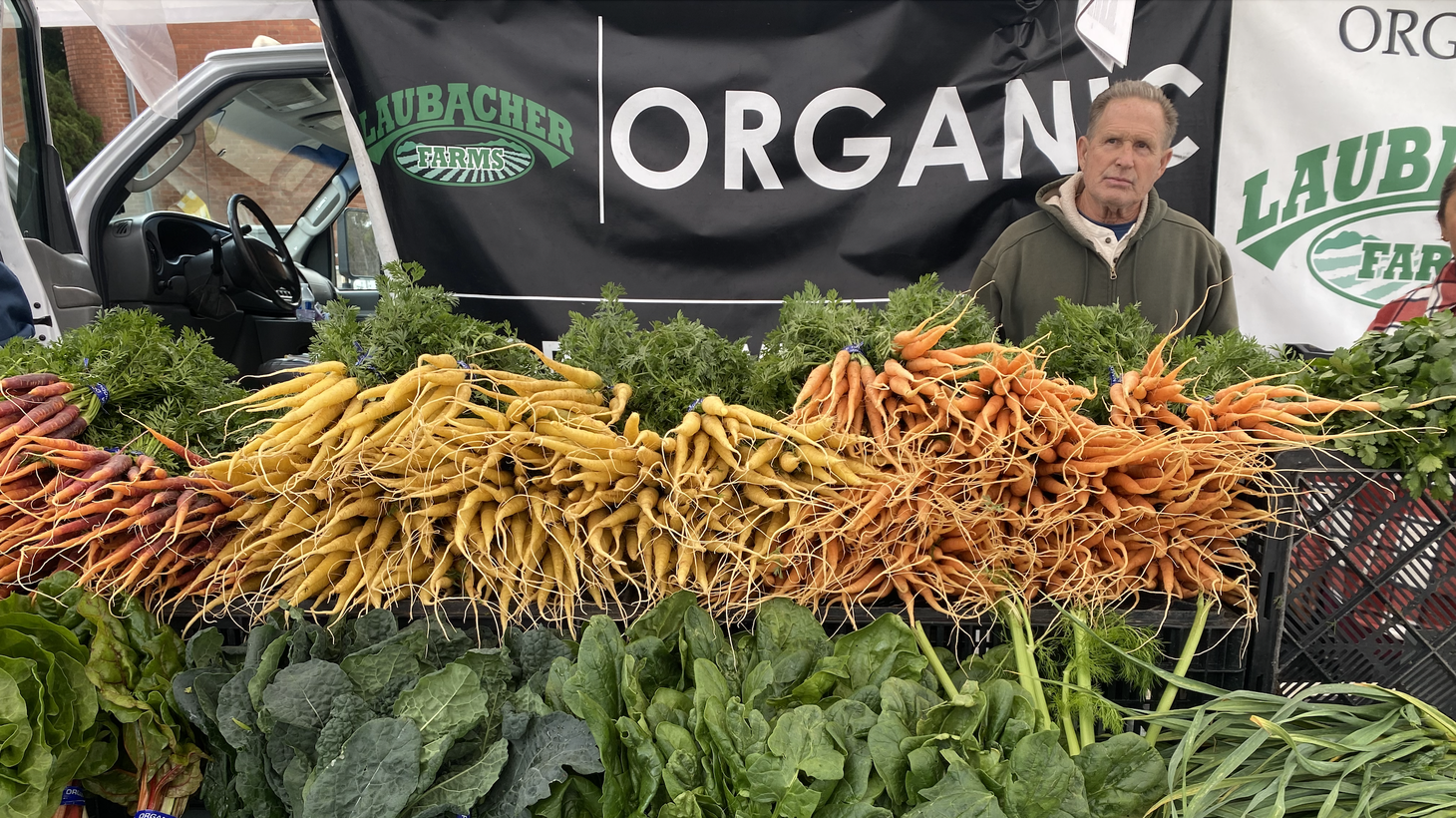 Paul Thurston of Laubacher Farms braved the extreme weather to bring his carrots to market.