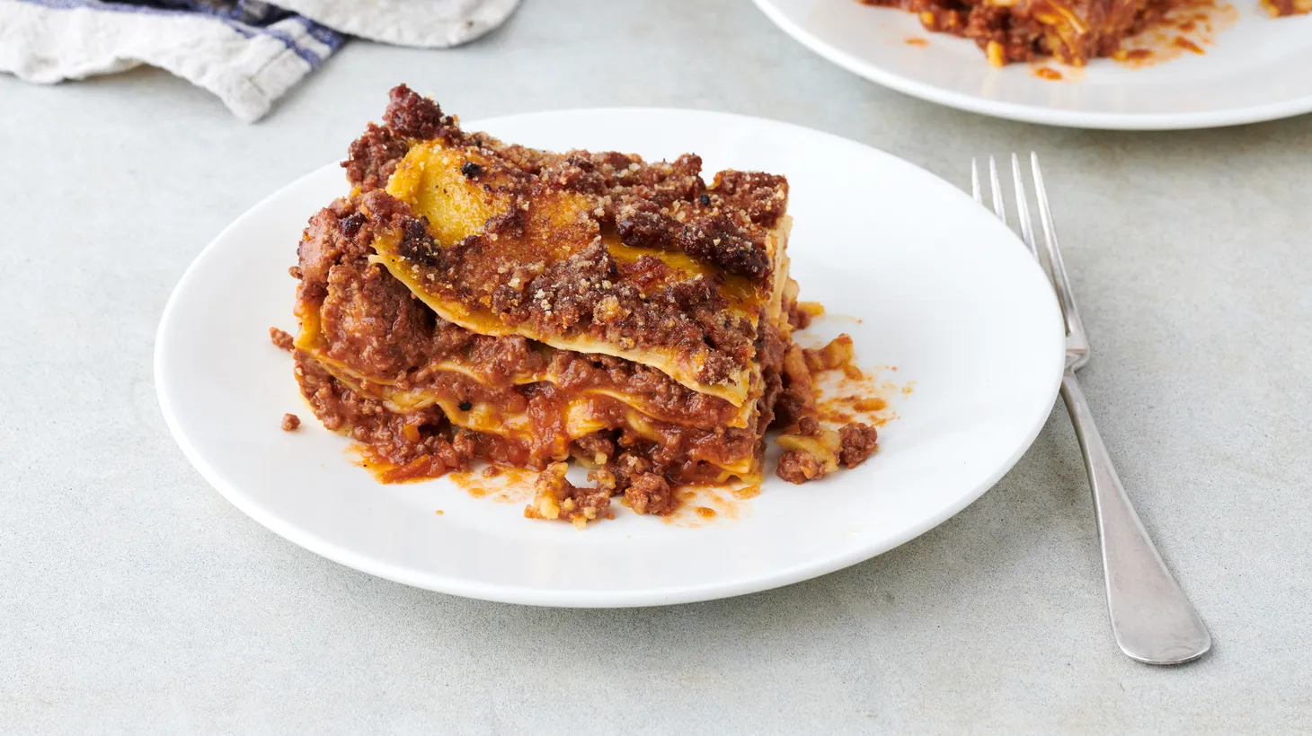 A dairy-free lasagna is perfect for keeping kosher by using a broth instead of milk in a bechamel, and pasta sheets made of matzah.