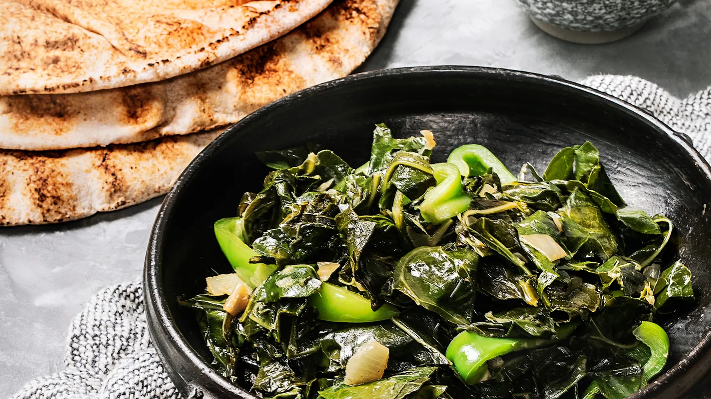 Gomen, essentially Ethiopian collard greens, are used in a wot or stew recipe, can be served as a side dish or welcome the addition of meat.