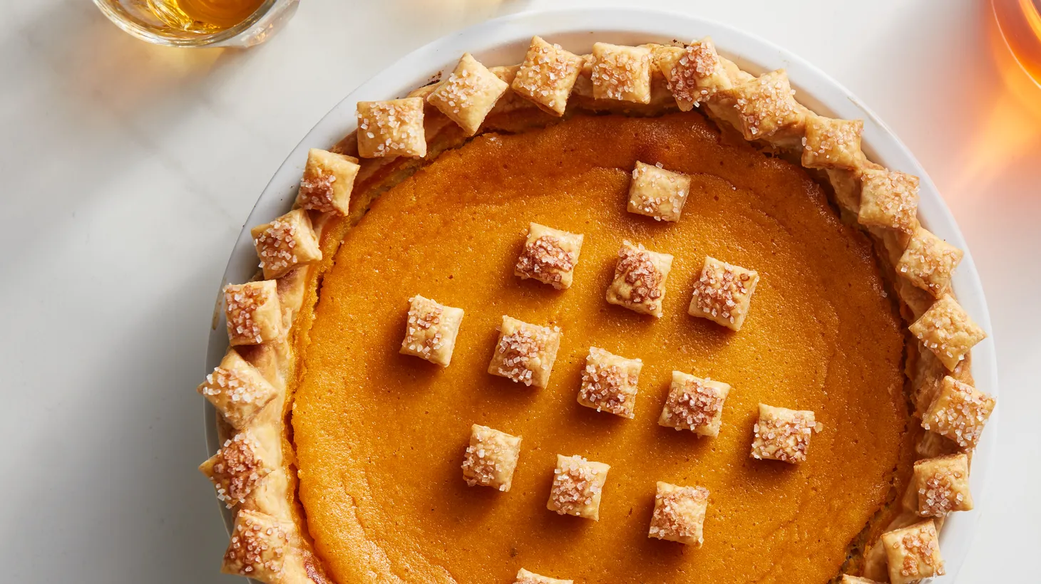 Genevieve Ko jazzes up her roasted sweet potato pie with doses of nutmeg while replacing standard evaporated milk with heavy cream (and some rum) for a dessert that moves easily from Thanksgiving to Christmas.