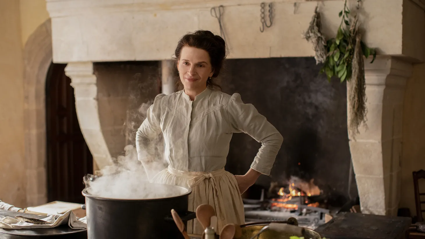 Juliette Binoche plays Eugénie, an artist in the kitchen, in Tran Anh Hung's "The Taste of Things."