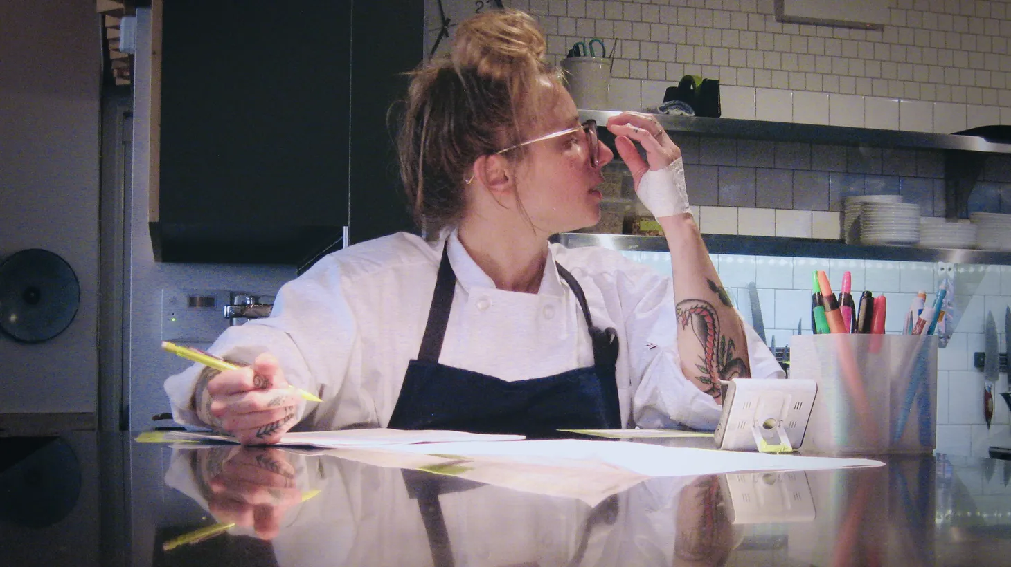 Chef de cuisine Tayler Ploshehanski of Wherewithall in Chicago expedites at the pass.