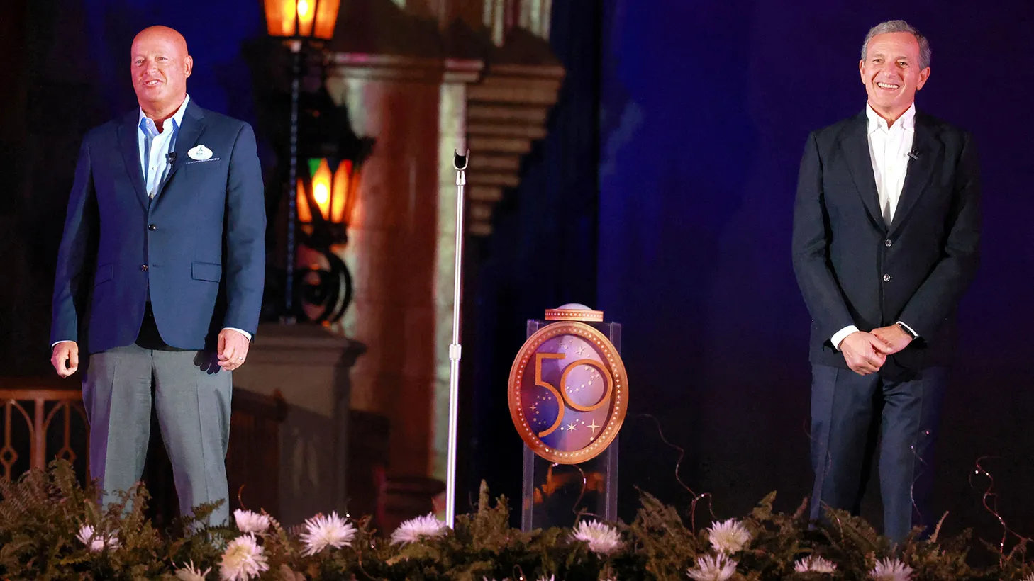 Disney’s CEO Bob Chapek (left), and Bob Iger, executive chairman, deliver remarks during the rededication ceremony marking the 50th anniversary of Walt Disney World, in Florida, on September 30, 2021.