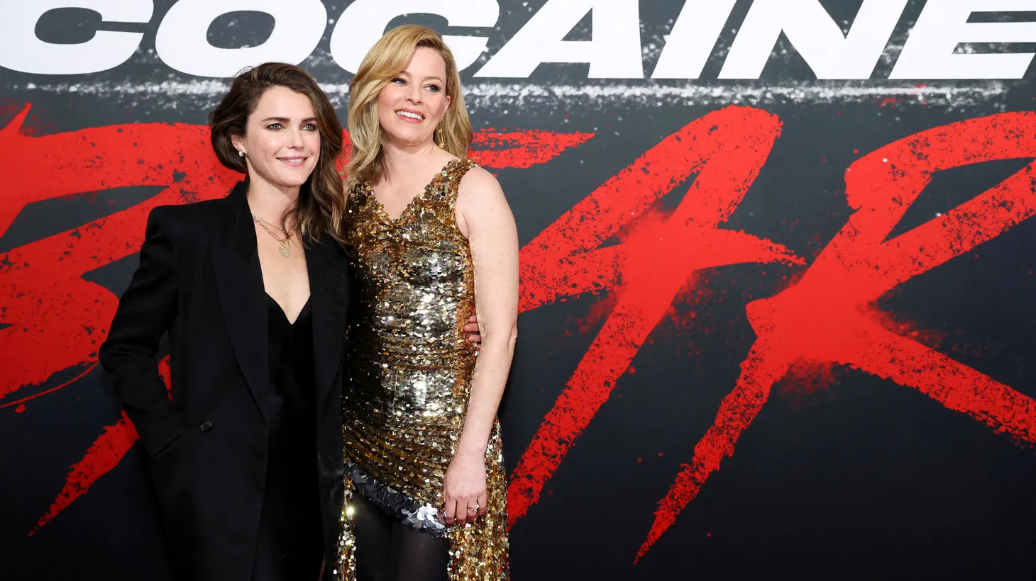 Director and producer Elizabeth Banks (right) and cast member Keri Russell attend a premiere for the film 'Cocaine Bear' in Los Angeles on February 21, 2023.
