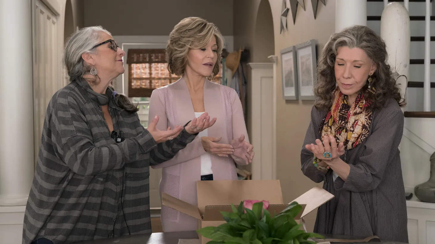 Showrunner Marta Kauffmann talks to actors Lily Tomlin and Jane Fonda on the set of Netflix’s “Grace and Frankie.”