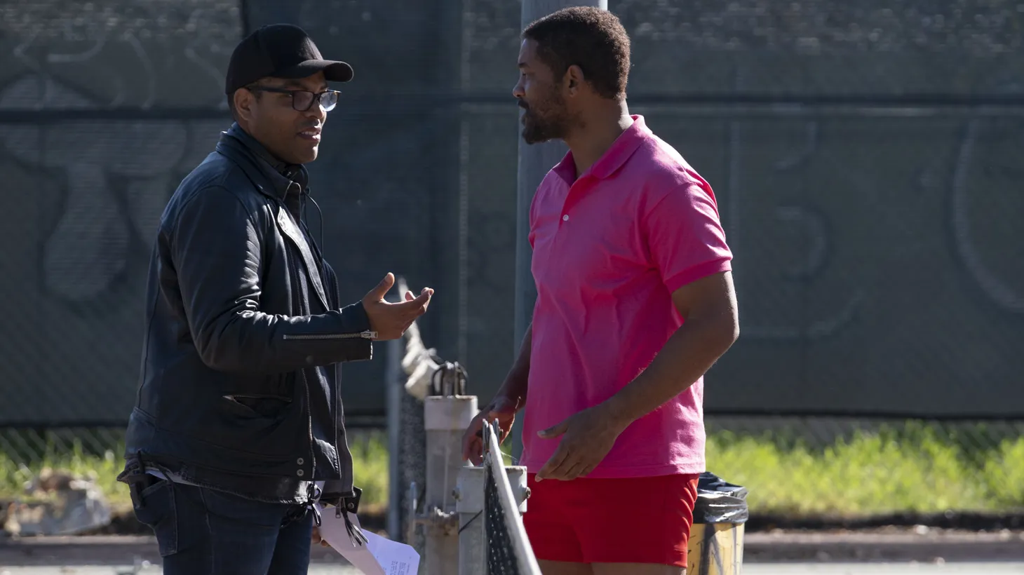 “King Richard” director Reinaldo Marcus Green appears on set with star Will Smith.