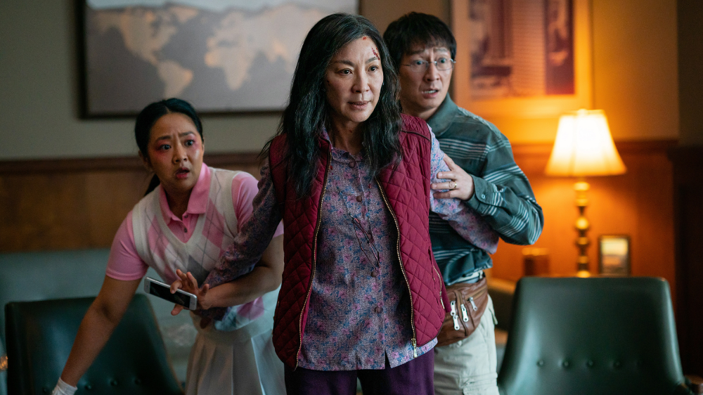 Actors Stephanie Hsu, Michelle Yeoh and Ke Huy Quan perform a scene of “Everything Everywhere All at Once.”