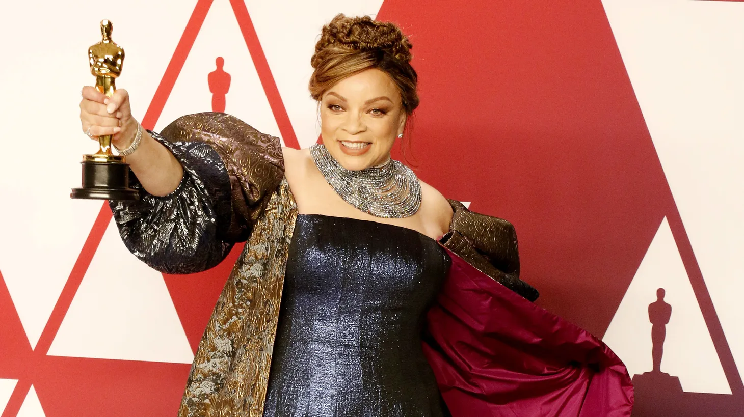 Custom designer Ruth E. Carter has won two Oscars. Here, she shows off her first for “Black Panther” during the 91st Annual Academy Awards held on February 24, 2019.