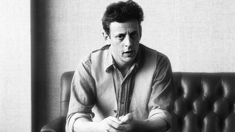 Composer Philip Glass and director Godfrey Reggio stop by in May 1983 to discuss “Koyaanisqatsi,” a cinematic collaboration now considered a milestone of documentary film.