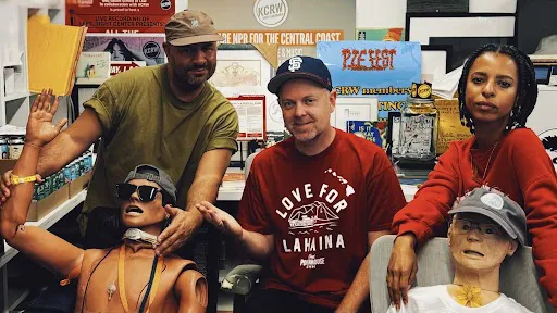 DJ Shadow… no stranger to KCRW’s Basement studio, but making his first appearance at HQ. The welcome wagon responds accordingly. (L to R) Anthony Valadez, DJ Shadow, Novena Carmel.