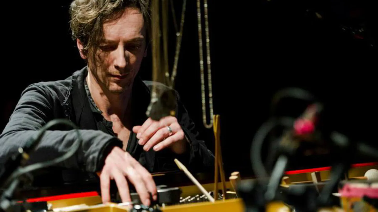 Hauschka is an experimental pianist based in Dusseldorf who integrates an assortment of toys into his piano playing.