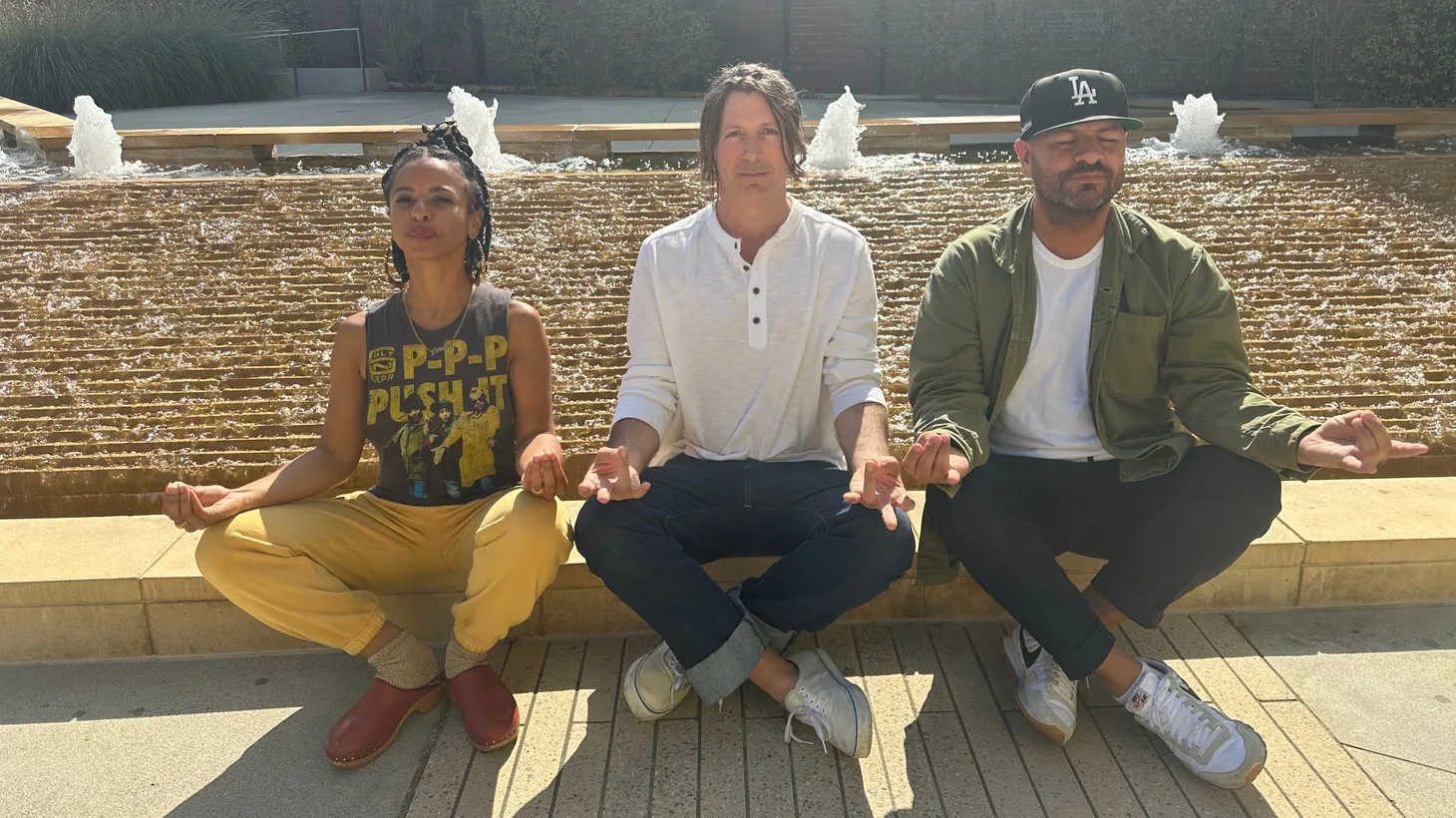 Getting zen, and reeling around the fountain with Poolside. (L to R) Novena Carmel, Jeffrey Paradise, and Anthony Valadez.