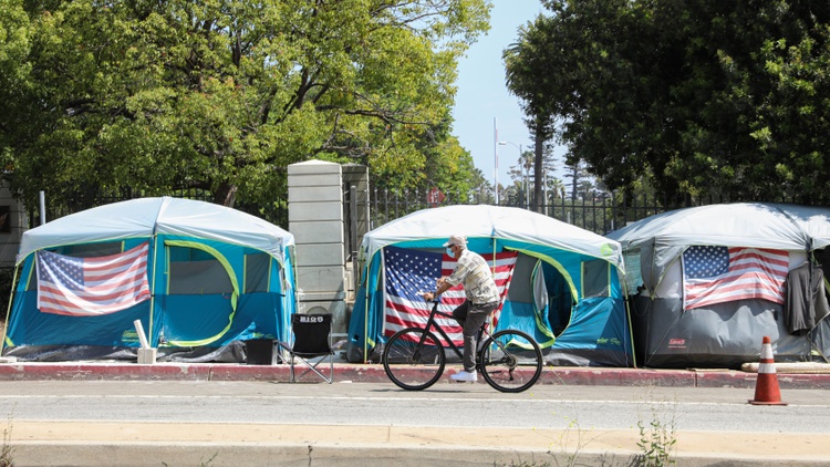 This homeless camp in one of LA’s toniest neighborhoods has its own hashtag, weekly barbeques, and politicians dropping by for photo ops. Welcome to Veterans Row.