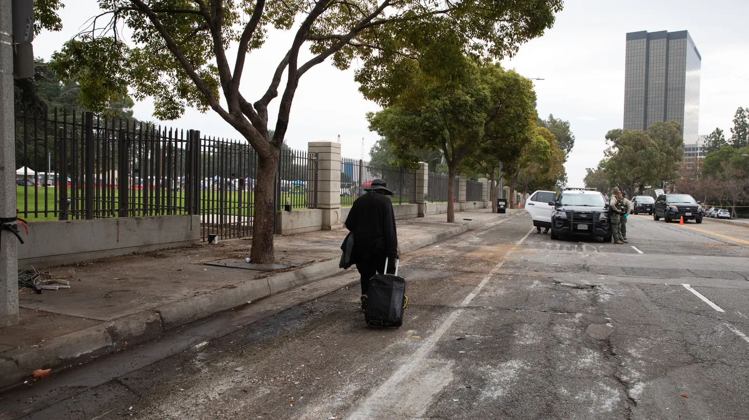 The sidewalk on San Vicente Boulevard the day after the Veterans Row homeless camp was cleared.