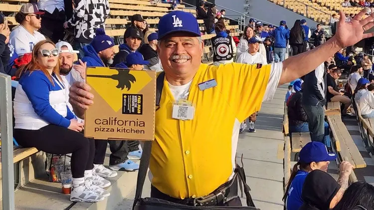 On baseball’s opening day, the Dodgers will host the Arizona Diamondbacks, as walking vendor Robert “Peanut Man” Sanchez starts his 50th season selling food to fans.