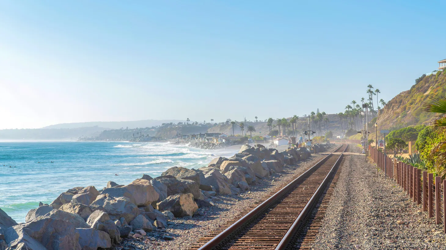 Train tracks run along the coast of San Clemente in California.