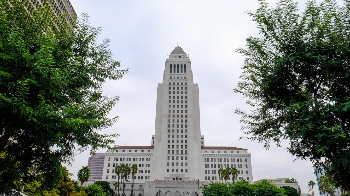 LA City Hall is seen on a cloudy day.