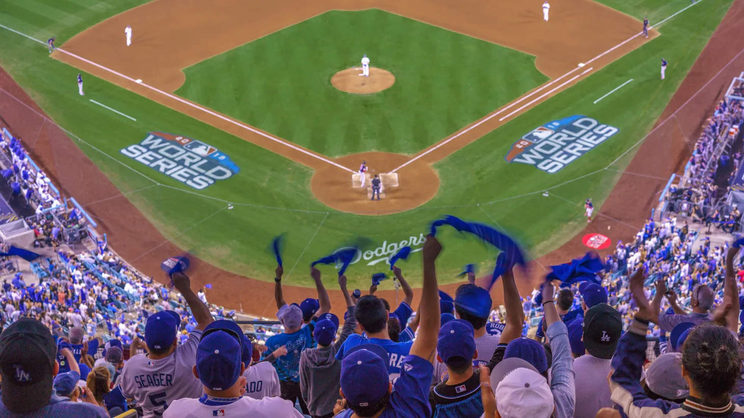 OCTOBER 26, 2018 - LOS ANGELES, CALIFORNIA, USA - DODGER STADIUM: fans celebrate as LA Dodgers defeat Boston Red Sox 3-2 in game 3, the longest game in World Series History