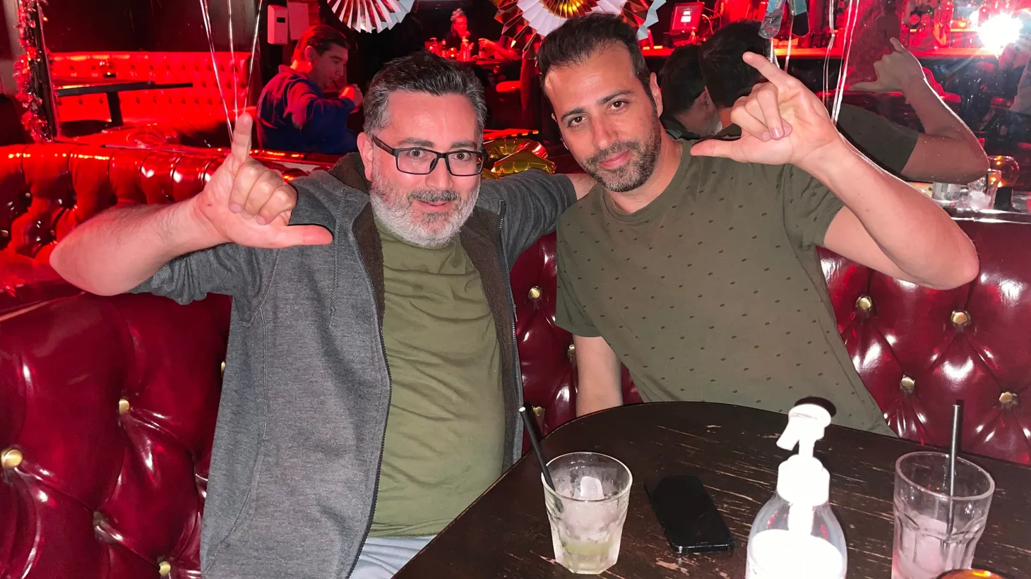 Aric Fedida (left) and Aidan Geva (right) say it feels good to enjoy a maskless night at their Santa Monica-based karaoke bar, Gaslite.
