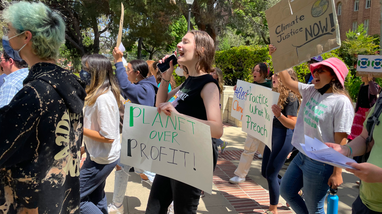 Paola Hoffman, 18, marches to a rally at UCLA to give a speech about greenwashing on Earth Day.