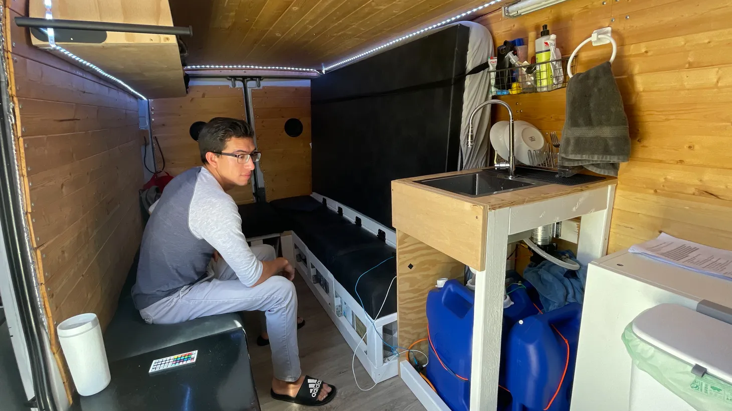 “I've been given housing offers by friends that I’m meeting, and I think I'd rather stick it out in the van. Just saves me money. It's my own little space, I don't share it with anyone. And I just like making upgrades,” says UCSB student James Estrada.