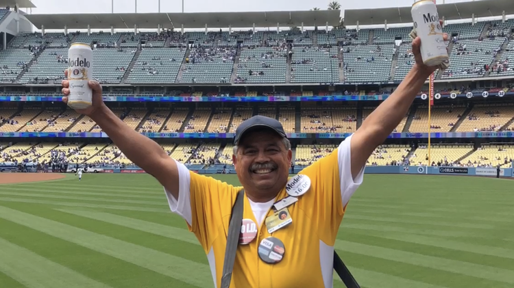 “Peanut Man” (Robert Sanchez) has been selling concessions at Dodger Stadium for some 50 years. “You're gonna get hurt. You might slip on nacho cheese,” he says.