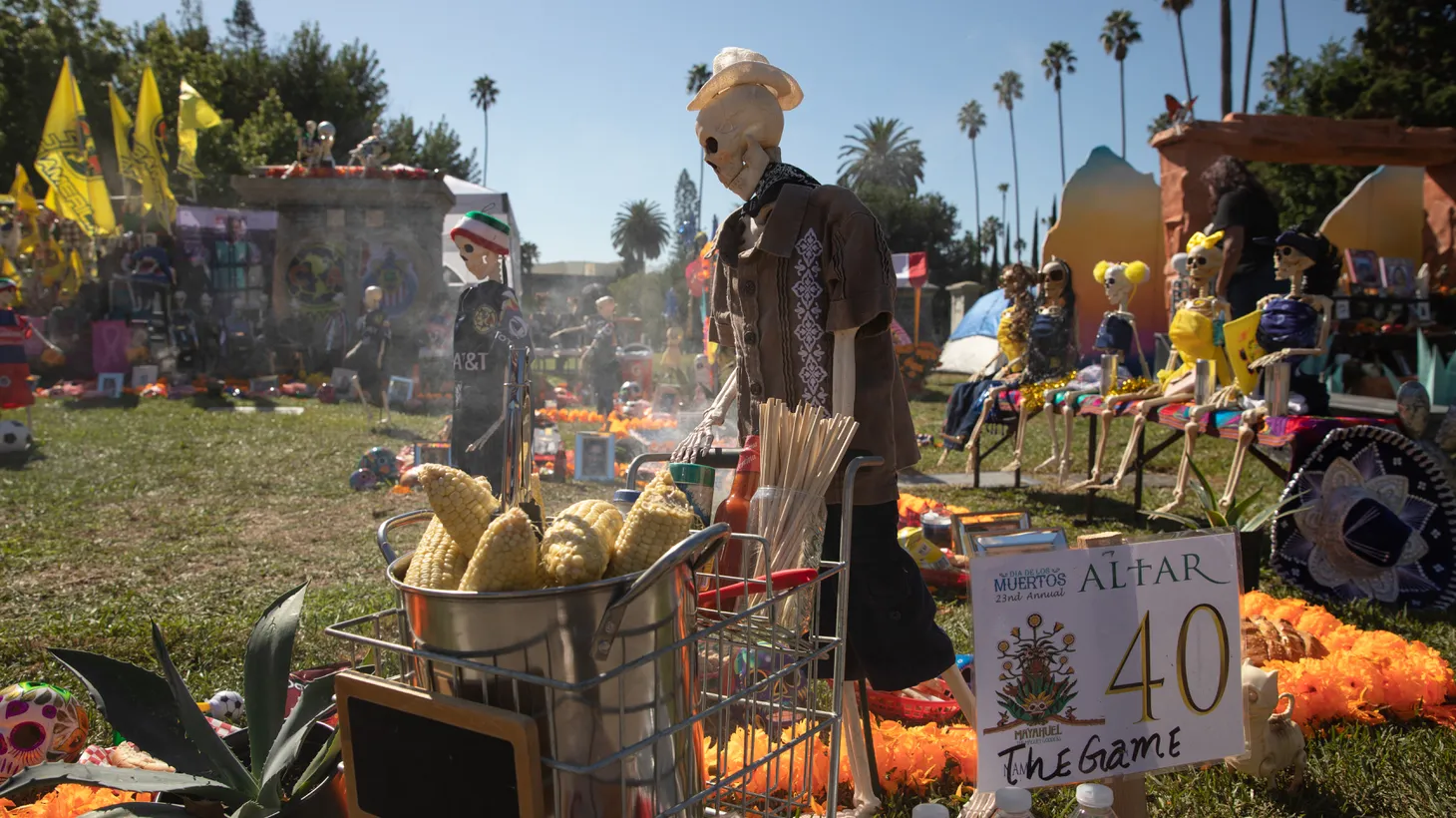 Alfredo Romero’s altar is filled with decorative skeletons representing figures like the “corn man” pushing his cart throughout the grounds.