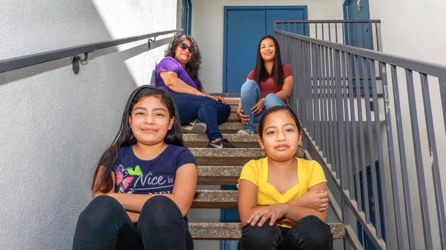 Mireya Pacheco (top left) and her three daughters, Mireyari, 17 (top right), Hossanna, 11, (bottom left) and Nefthali, 9 are beginning the new school year from their two-bedroom apartment in Pacoima. When the pandemic hit, dad lost work and the three girls started distance learning with a computer too outdated to run the programs they needed.