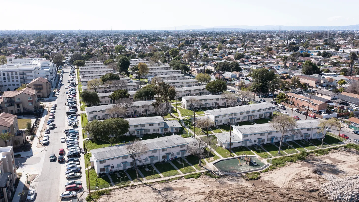 An aerial view shows historic public housing projects in Watts, California.