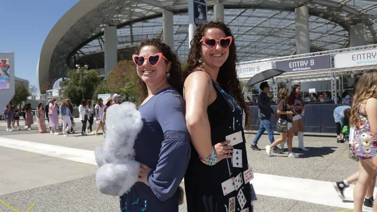 Outside SoFi stadium, fans who didn’t have tickets to Taylor Swift’s concert still find a way to sing, dance, and exchange friendship bracelets.