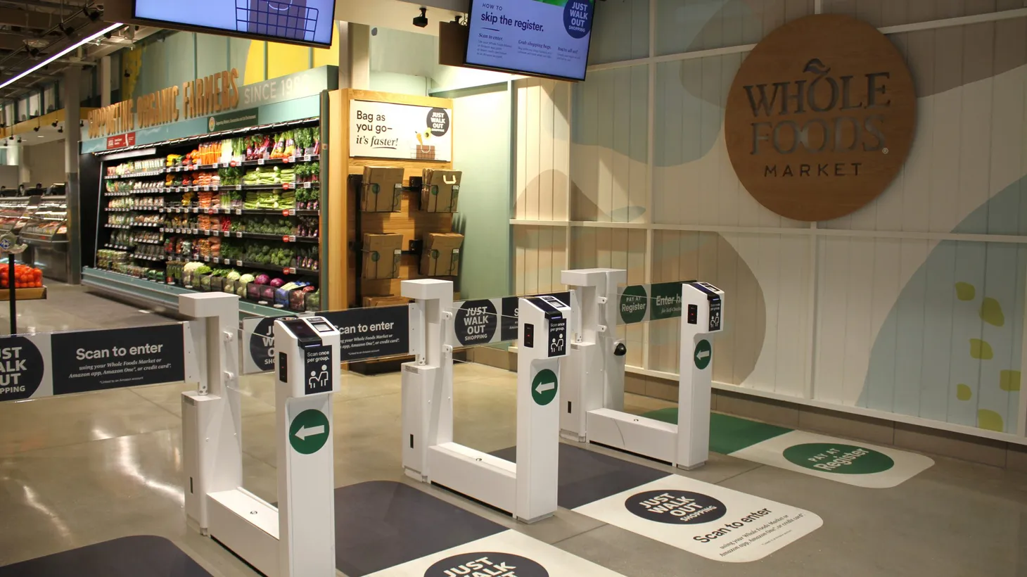 At the entrance of Whole Foods in Sherman Oaks, customers scan a QR code or their palm to begin shopping.