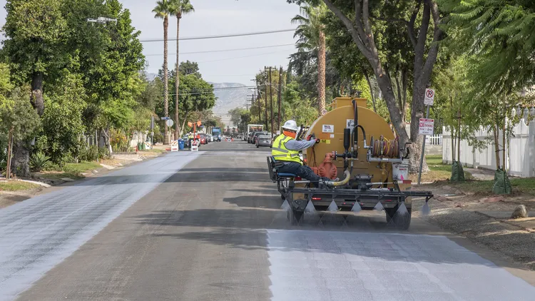 As summers get hotter, the City of LA is trying to keep neighborhoods cooler by painting streets with lighter colors. And it actually works.