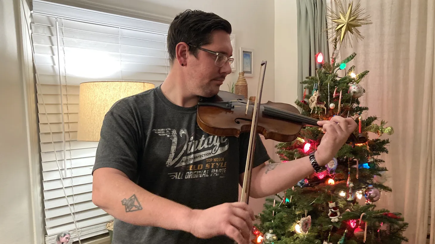 Elliott Orion plays his violin 10 years after an accident upended his life.