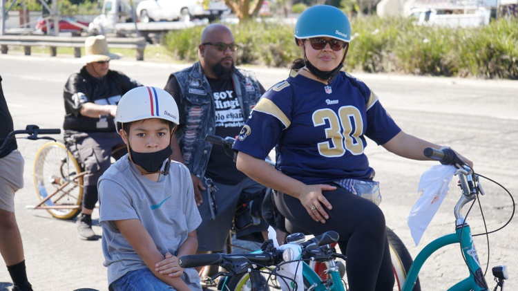 Once a month, members of the East Side Riders club distribute food to unhoused Angelenos along their cycling route. The group has evolved since John Jones III founded it in 2008.