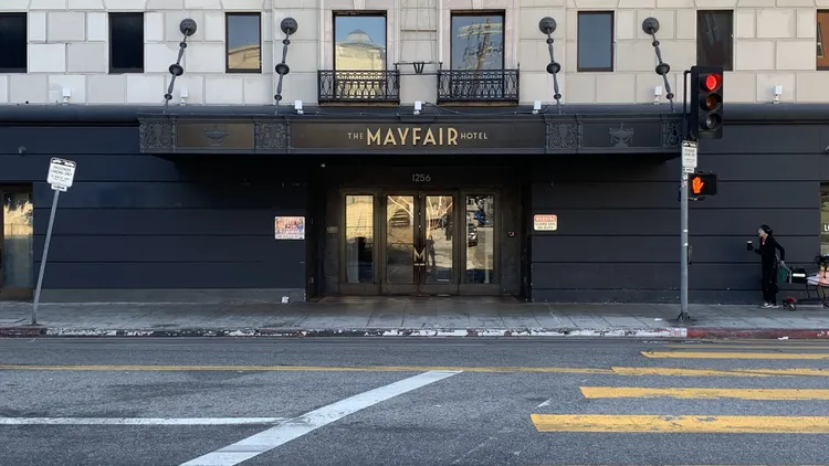 LA will purchase the Mayfair Hotel in Westlake for transitional housing. The move signals more city investment in temporary shelter – not just permanent housing.