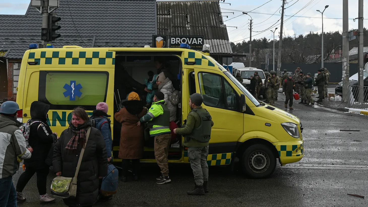 Evacuation efforts of Irpin continue through adverse weather conditions. Ukrainian first responders and volunteers ferried refugees to Kyiv in buses and vans. Civilians have been evacuating the region after Russia invaded Ukraine territory. Photo taken in Irpin, Ukraine, March 8, 2022.