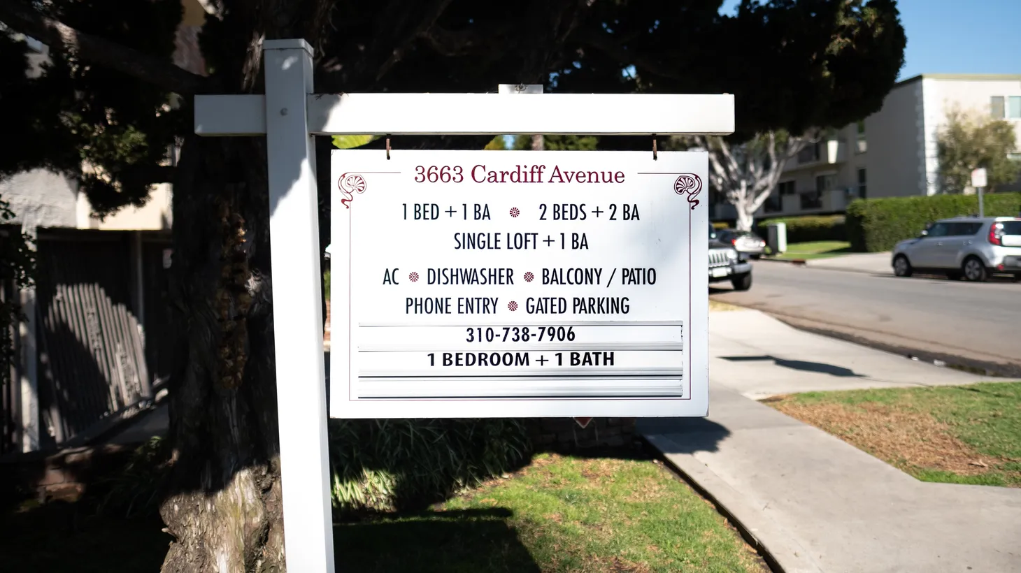 An apartment rental sign is placed along Cardiff Ave. in the Palms neighborhood of Los Angeles.