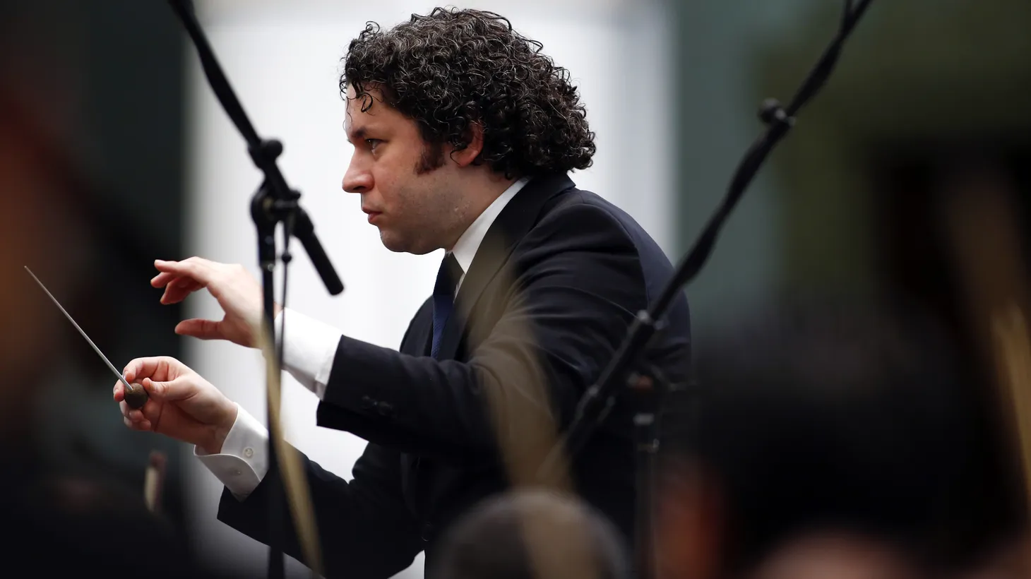 Gustavo Dudamel conducts a concert at the foreign ministry headquarters in Caracas, Venezuela, February 15, 2014. “Whatever we come from — religion, economically, politically — we can sit together and be united by the message of art,” he tells KCRW.