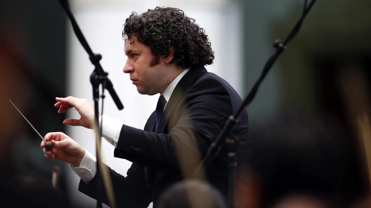 Gustavo Dudamel conducts a concert at the foreign ministry headquarters in Caracas, Venezuela, February 15, 2014. “Whatever we come from — religion, economically, politically — we can sit together and be united by the message of art,” he tells KCRW.