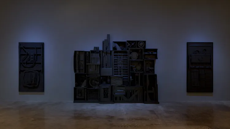 Louise Nevelson was one of the most iconic sculptors of the 20th century. LA’s Pace Gallery is showing her larger, monochromatic wooden sculptures as well as colorful collages.
